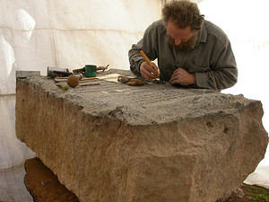 Leadbeater repairing the melted letters in the inscription