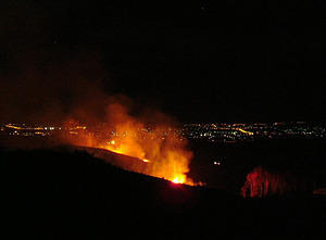 burn-off, eastern slope of Stromlo with lights of Canberra in distance, Oct 2004