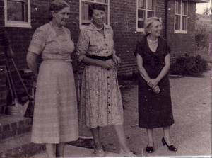 L to R: Doris Hogg, Miriam Dunham and Priscilla Bok, hosting a birthday party, March 19, 1958 in typical style