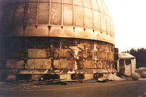 Plates buckled and debris fallen from inside dome