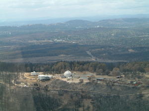 View of Stromlo's Yale-Columbia, Visitors Centre, 74-inch and workshops