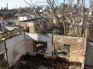 All floors are covered with ash and rubble.