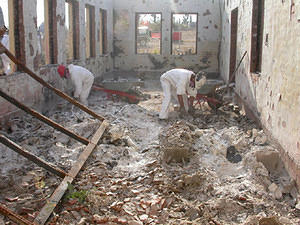 The library annexe. Fine ash is all that's left of fine old volumes.