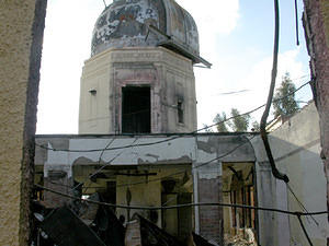 Library and heliostat tower before start of cleanup.