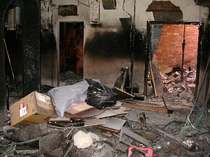 The basement, looking toward the stairwell (left). The base of the tower is on the right.