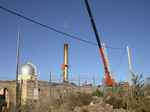 Preparing to lift the chimney.