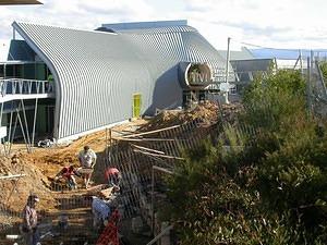 The rock walls and lanscaping are underway
