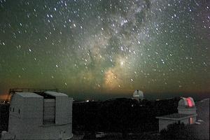 The ANU 2.3m telescope building, the Anglo-Australian Telescope dome and the ANU 24-inch telescope dome.