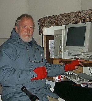 Bob Shobbrook dressed for a winters night at the control computer for the photometer on the ANU 24-inch telescope.