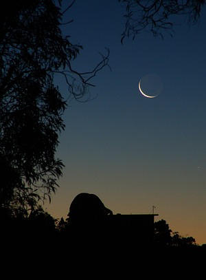 Moon sets behind 40 inch telescope